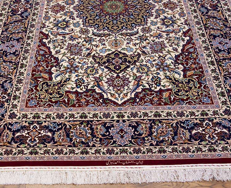 Elegant Persian rug, handmade Persian Isfahan vegetable dyed rug made from kork wool and silk. 5x7 rug with 460 knots per square inch.
