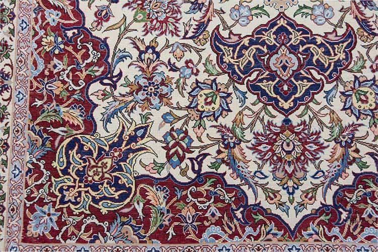 Elegant Persian rug, handmade Persian Isfahan vegetable dyed rug made from kork wool and silk. 5x7 rug with 460 knots per square inch.
