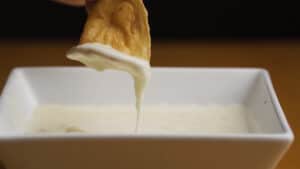 screenshot.00_00_47_04.Still059132 A chip dipped in queso