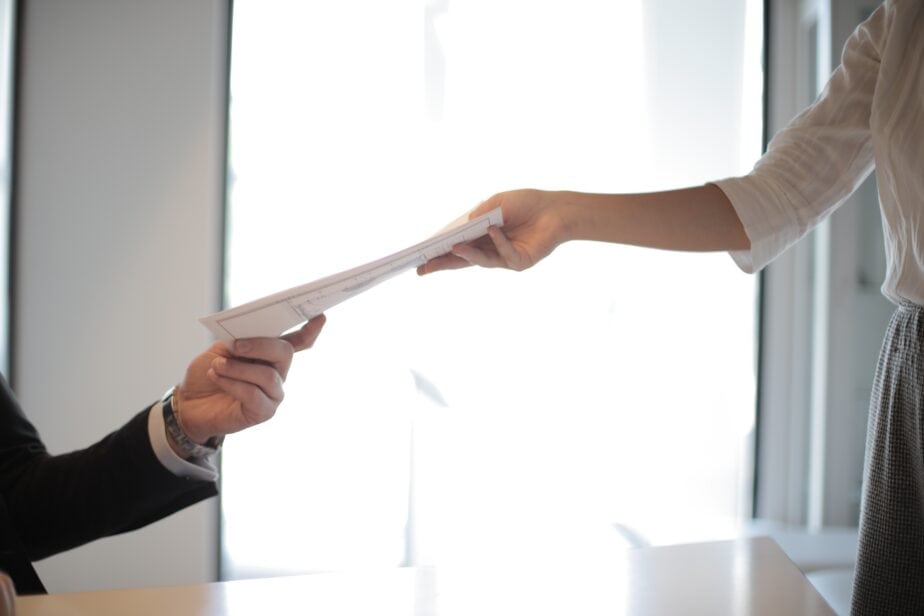 Handing a CV to the hiring manager