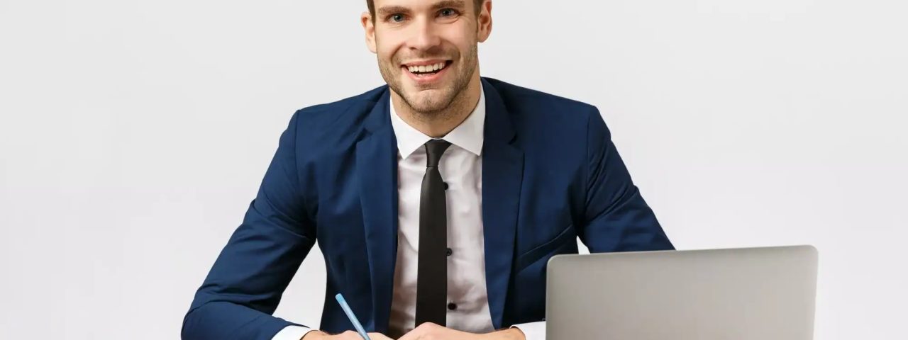 Business, office and corporate concept. Handsome, cheerful blond bearded guy in classic suit