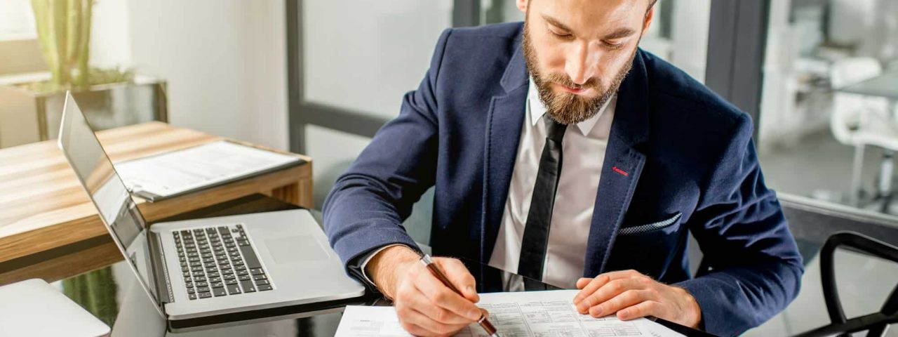 Tax manager working at the office