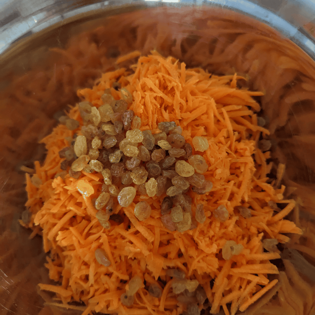 grate carrot golden raisins