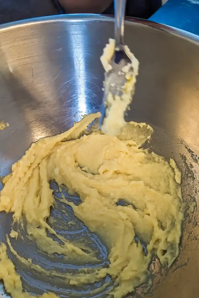 mixing the egg into the wet ingredients