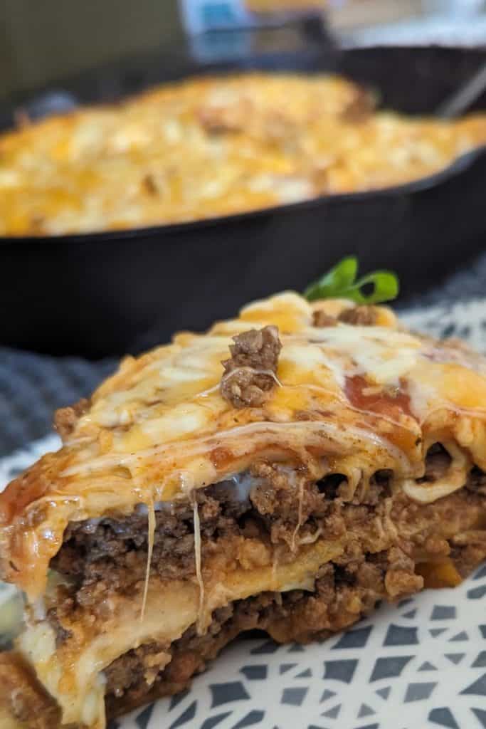 cheesy taco bake served with green onion