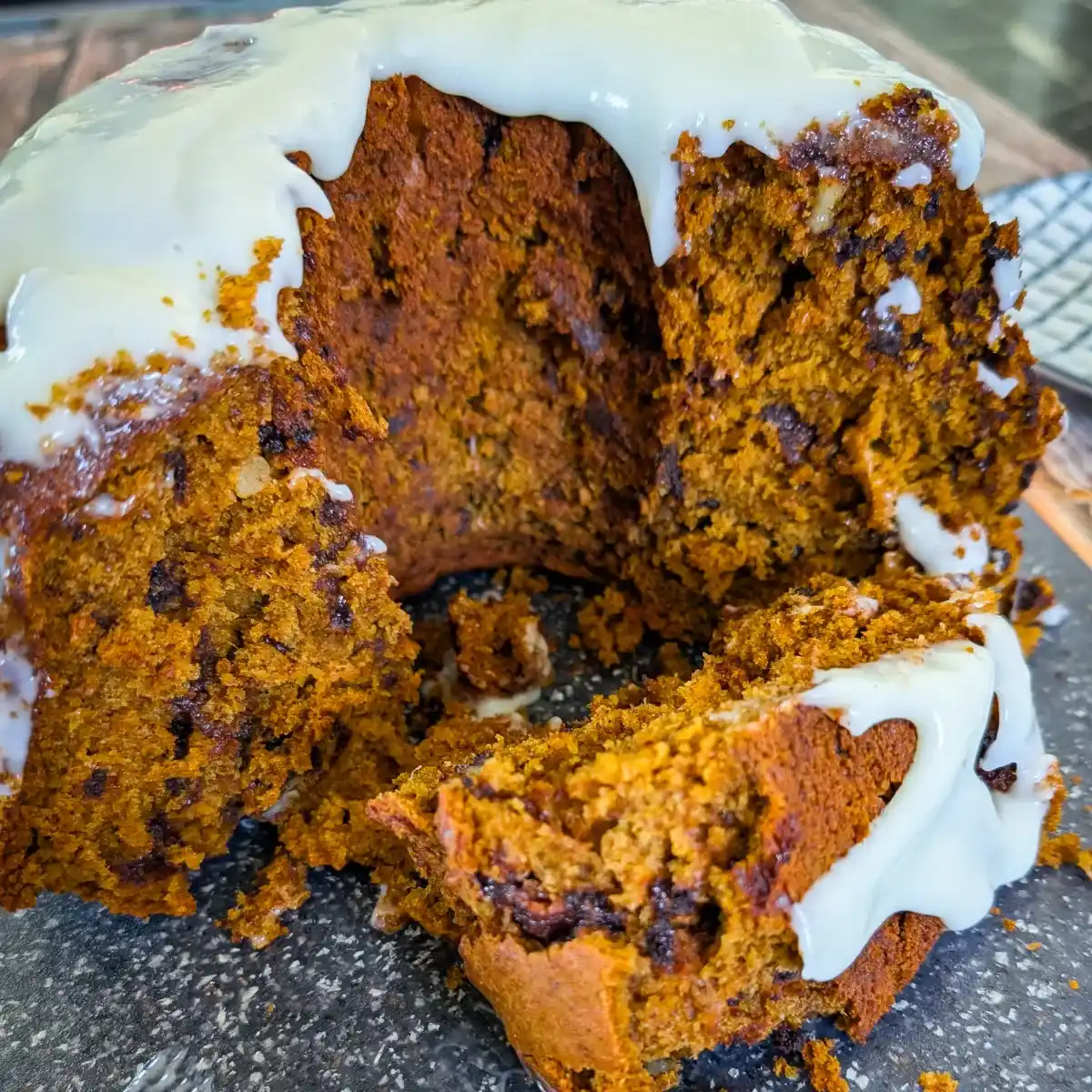 inside the pumpkin chocolate chip bundt cake with cream cheese frosting