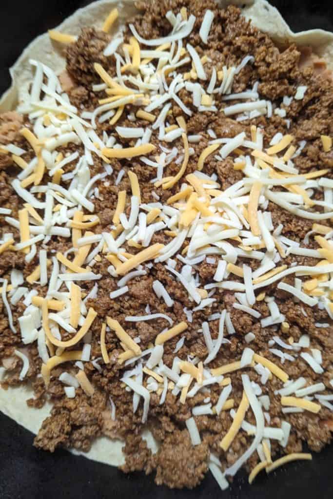 Tex Mex cheese on taco meat