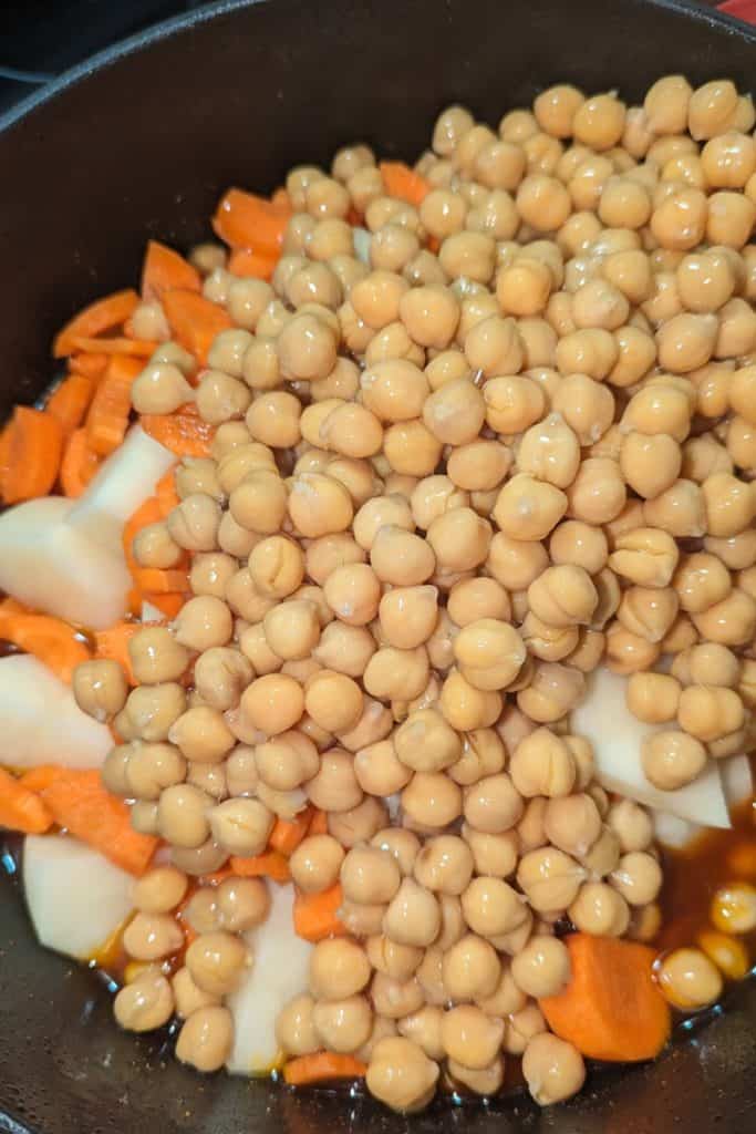 add drained chickpeas to lamb tagine