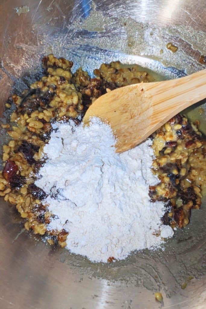 add flour baking powder to date nut mixture