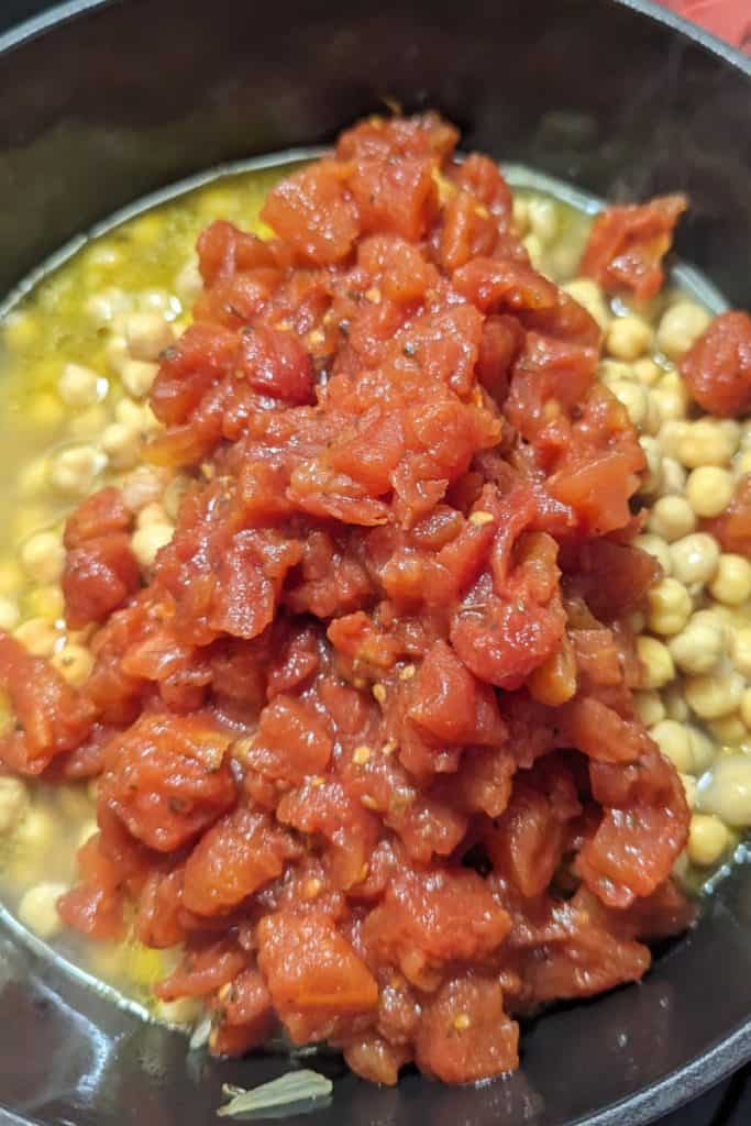 add the canned drained tomatoes