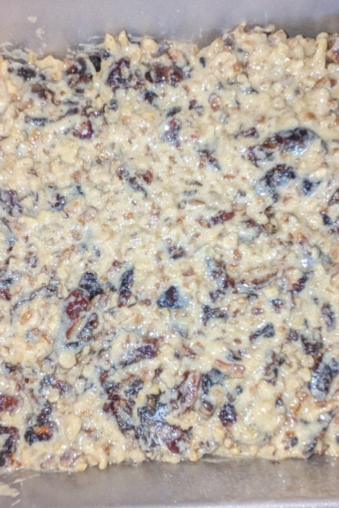 spread date and walnut square batter into prepared pan
