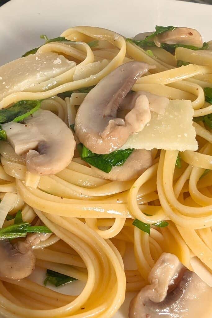 serving Mushroom linguine pasta (