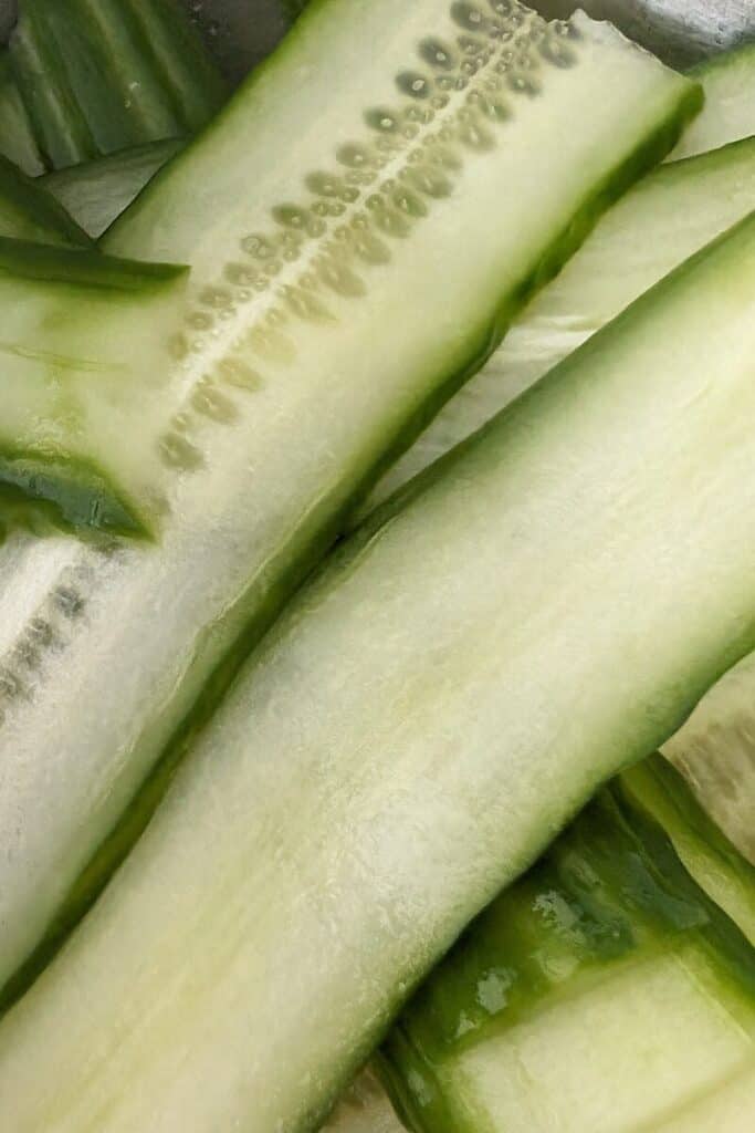 slicing cucumber thinly lenghwise