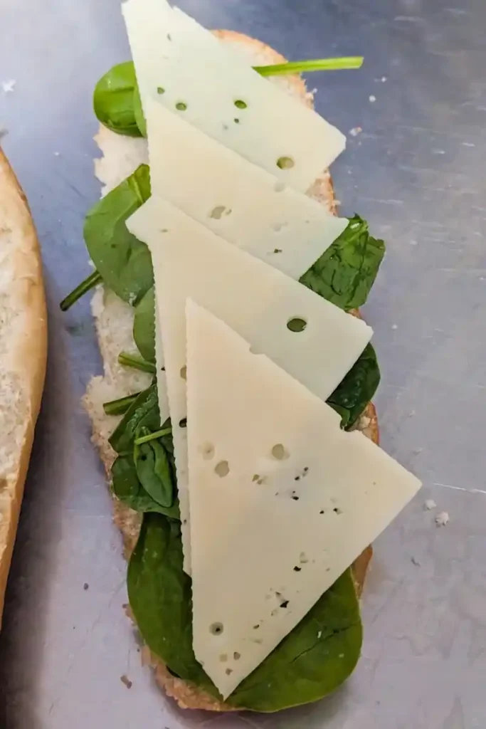 adding swiss cheese triangles to sandwich