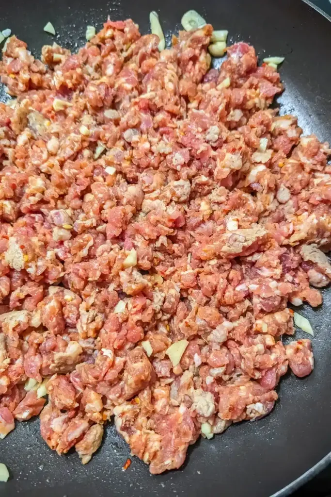 ground sausage in frying pan
