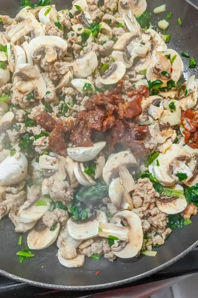 adding sun dried tomatoes