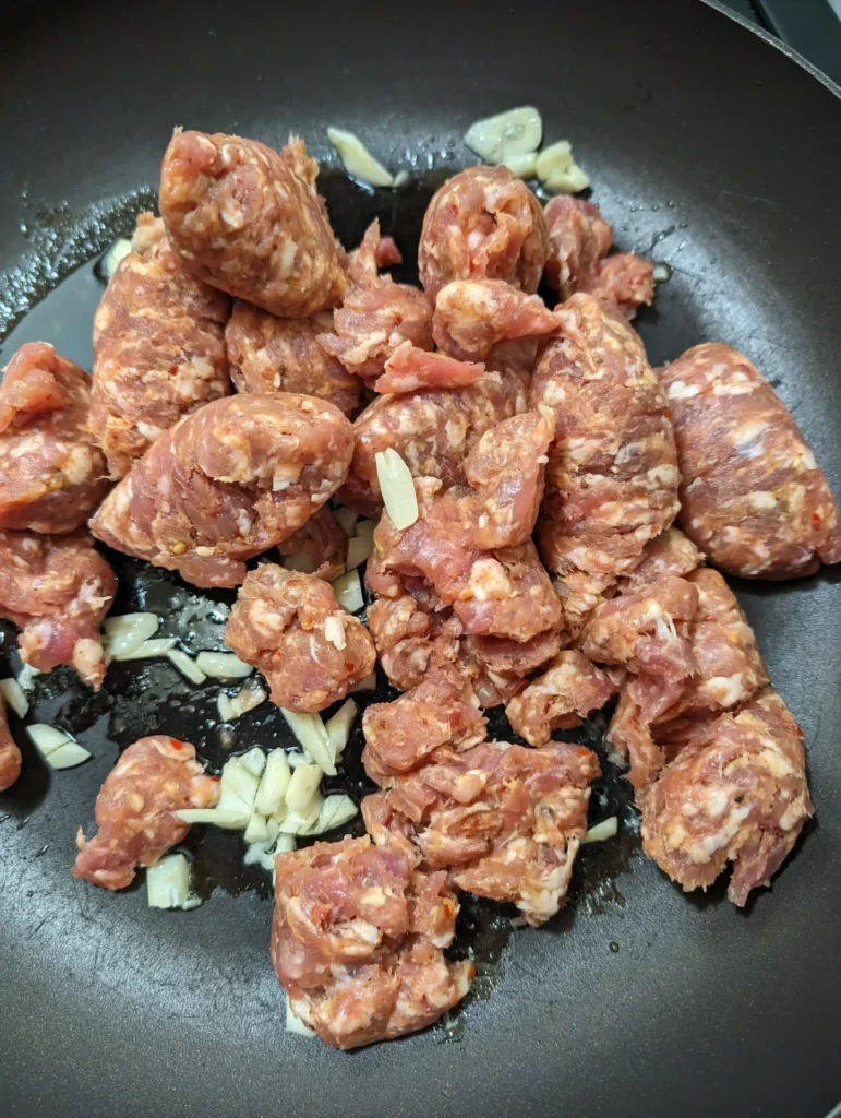 sausage in fry pan casings removed
