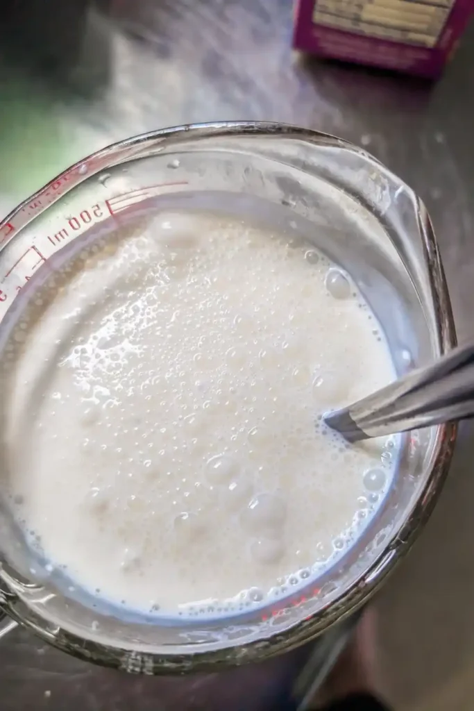 mixing the cream before adding the sausage mixture