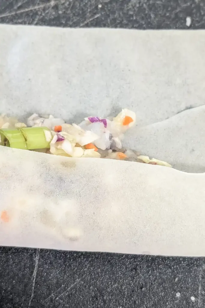 folding wrapper over the filling