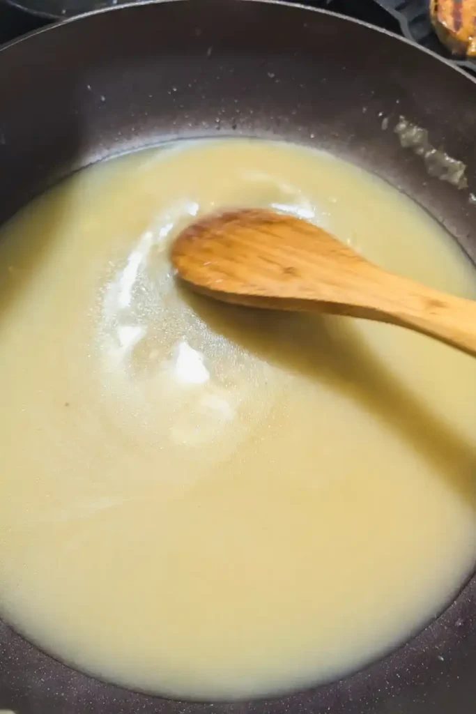 adding chicken stock to thin the roux