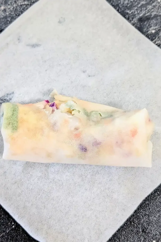folding the spring roll in the second wrapper