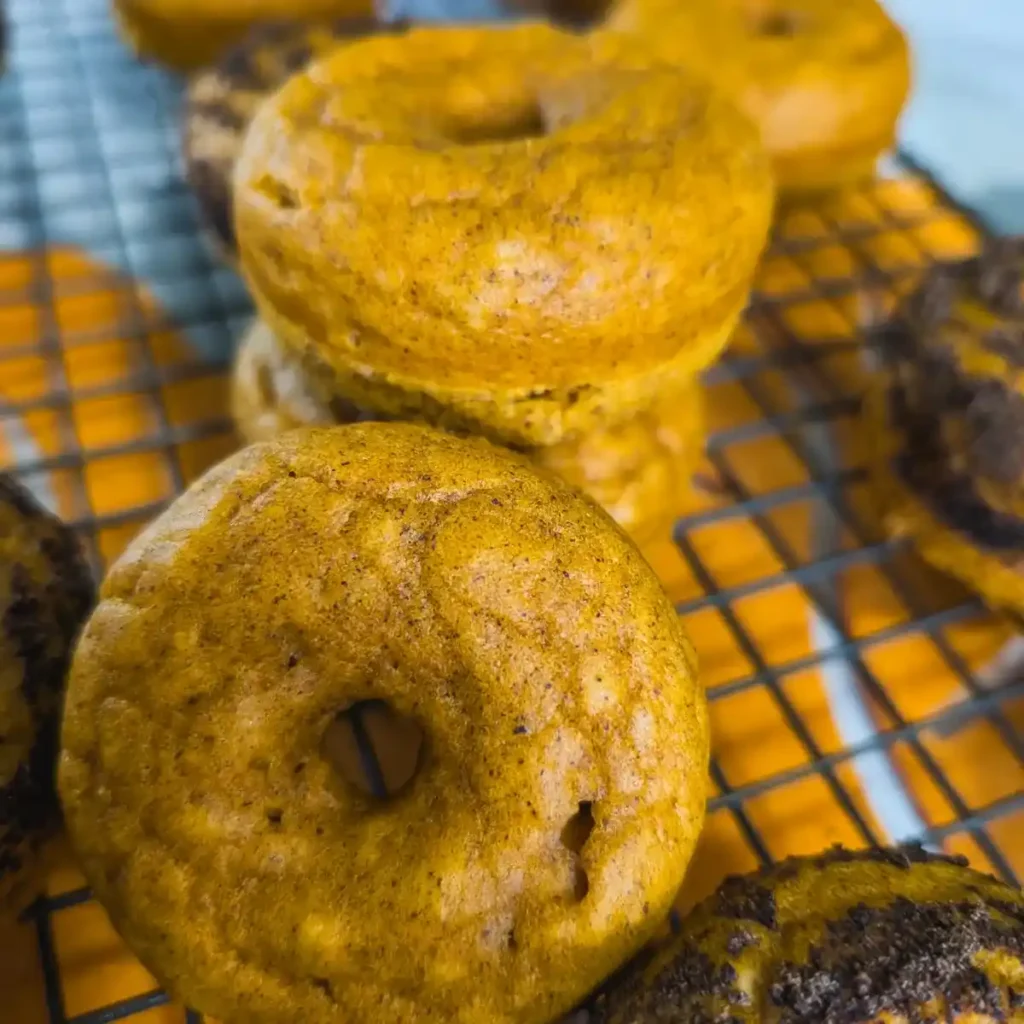 recipe card image of baked pumpkin donuts