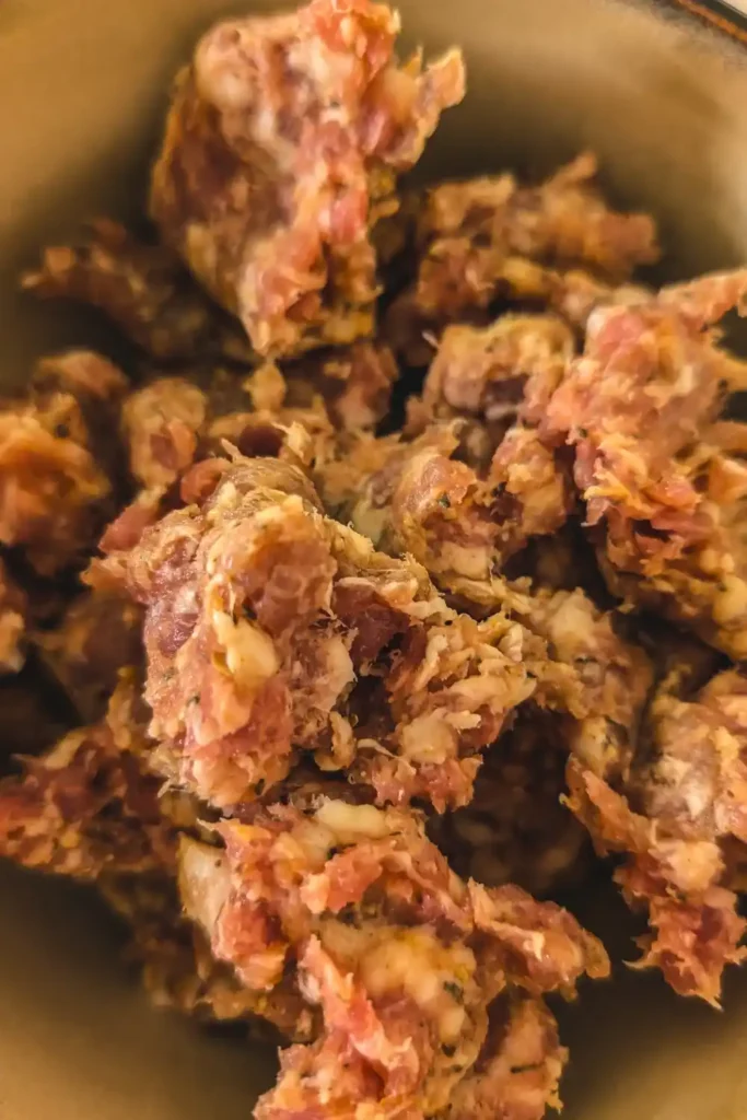 crumbled porketta sausage casing removed