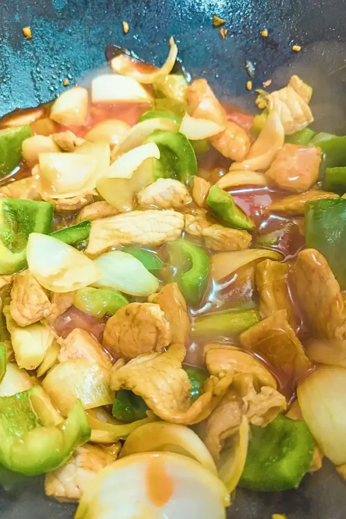 the sauced ingredients for the pork stir fry without peaches