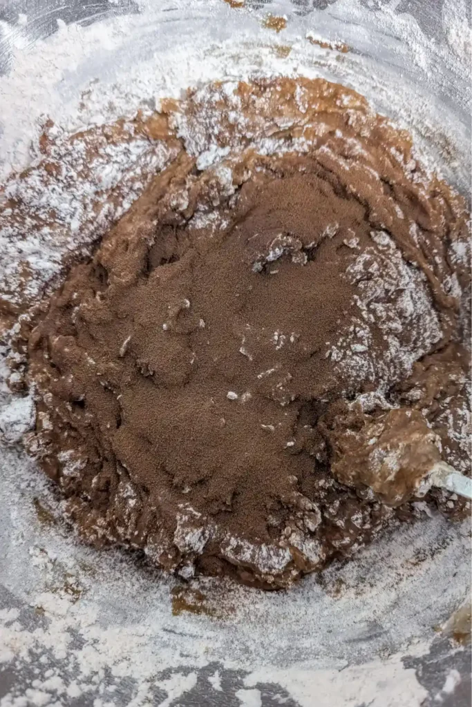 adding cinnamon nutmeg and espresso powder to the gingerbread batter