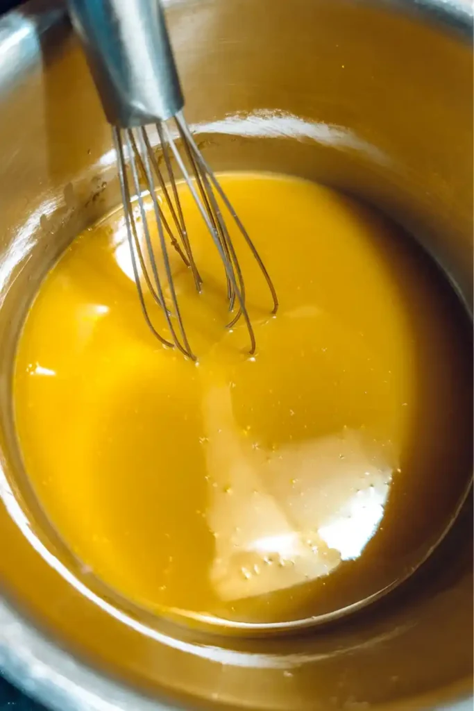 thoroughly mixed orange sauce heating