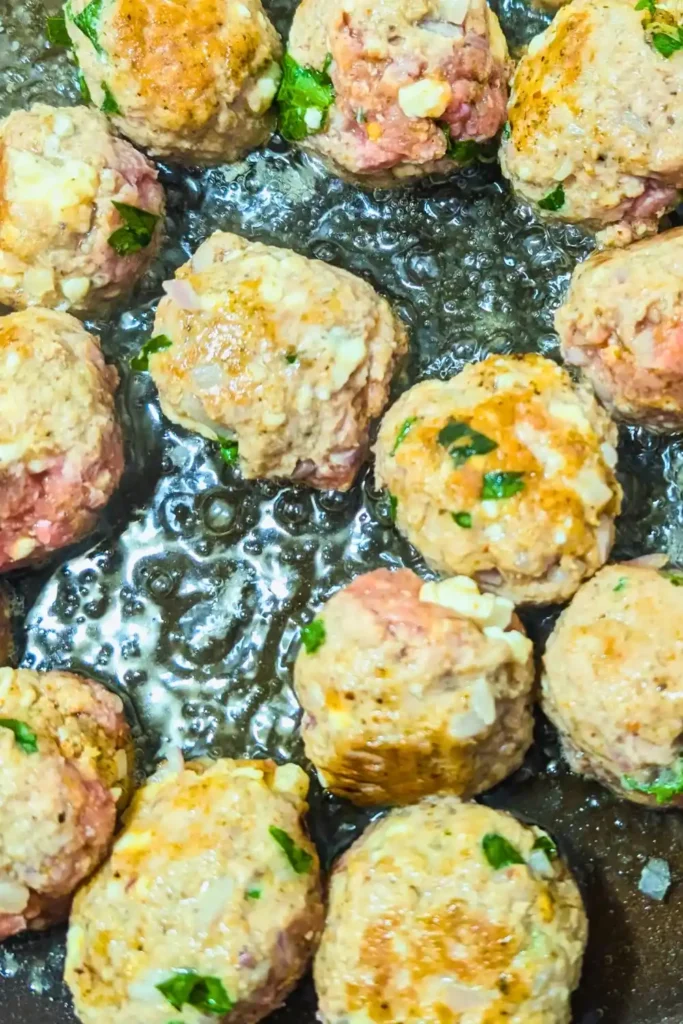 starting to brown the turkey meatballs in hot oil