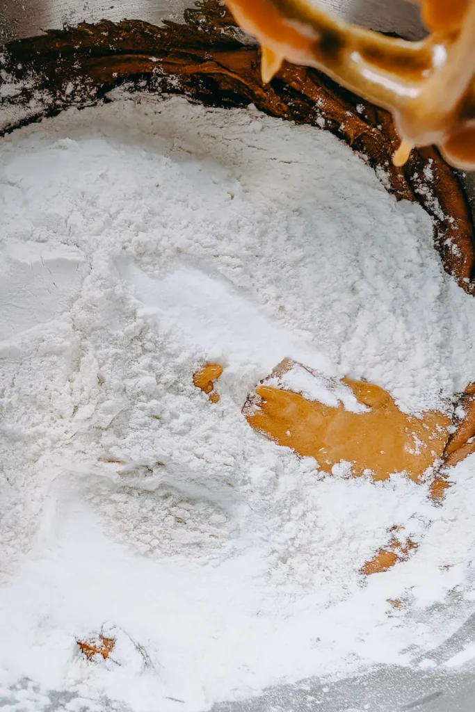 adding dry ingredients to wet for the wowbutter muffins