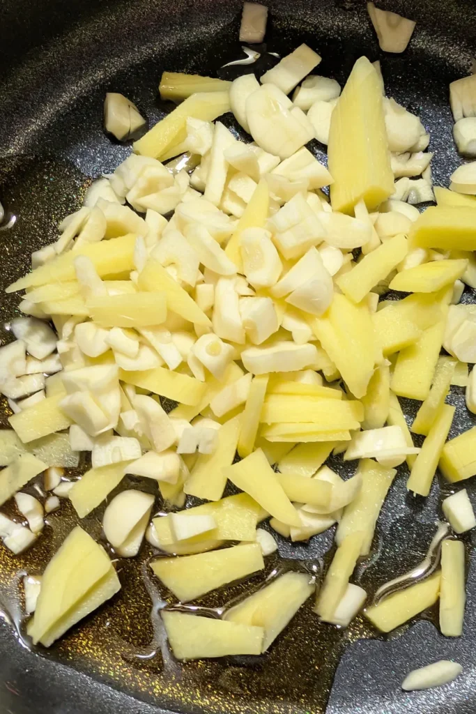 olive oil ginger garlic in saucepan