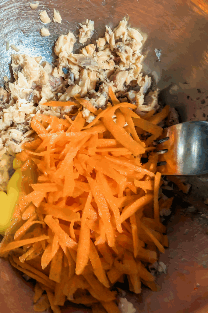 add grated carrot to egg and salmon