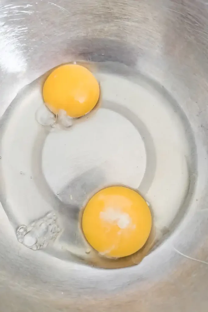 crack eggs into bowl