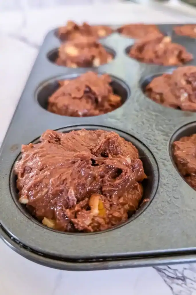 fill prepared muffin tin