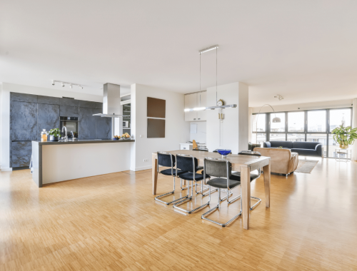 Chupps Interior Construction remodeled this apartment to feel bright and welcoming with a modern kitchen, open living space, and new paint.