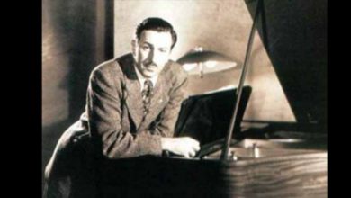 Walt Disney Leaning On Piano
