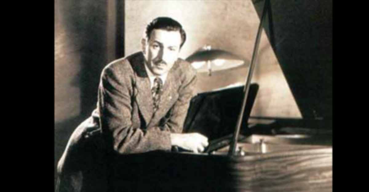 Walt Disney Leaning On Piano
