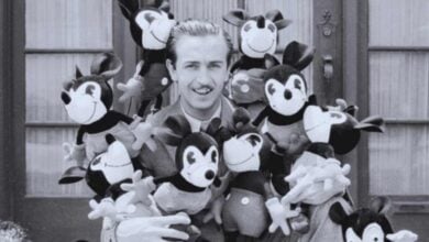 Walt Disney with Mickey dolls