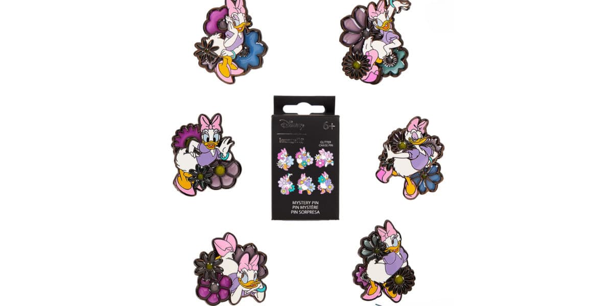 A set of colorful enamel pins featuring a cartoon duck character in various poses with flowers. The black packaging in the center displays "Mystery Pin" and age recommendation "6+.” The pins are arranged in a circle around the packaging.