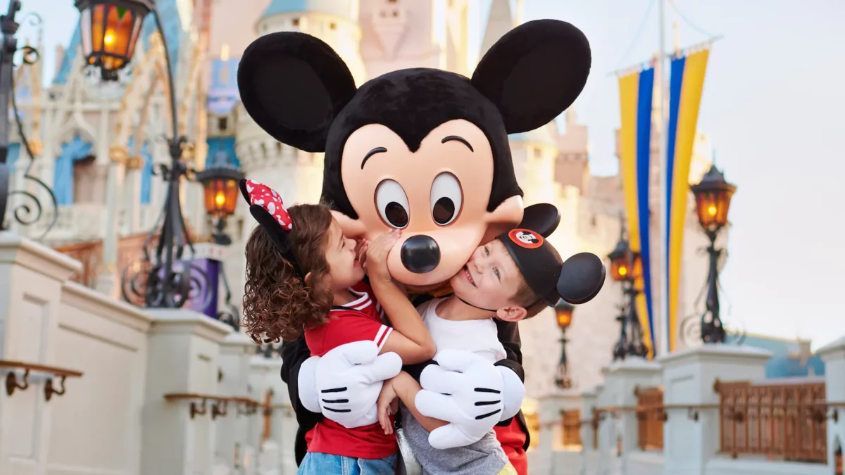 mickey mouse hugging kids