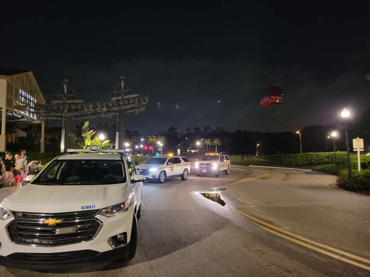 Security vehicles at Disney's Caribbean Beach Resort at night.