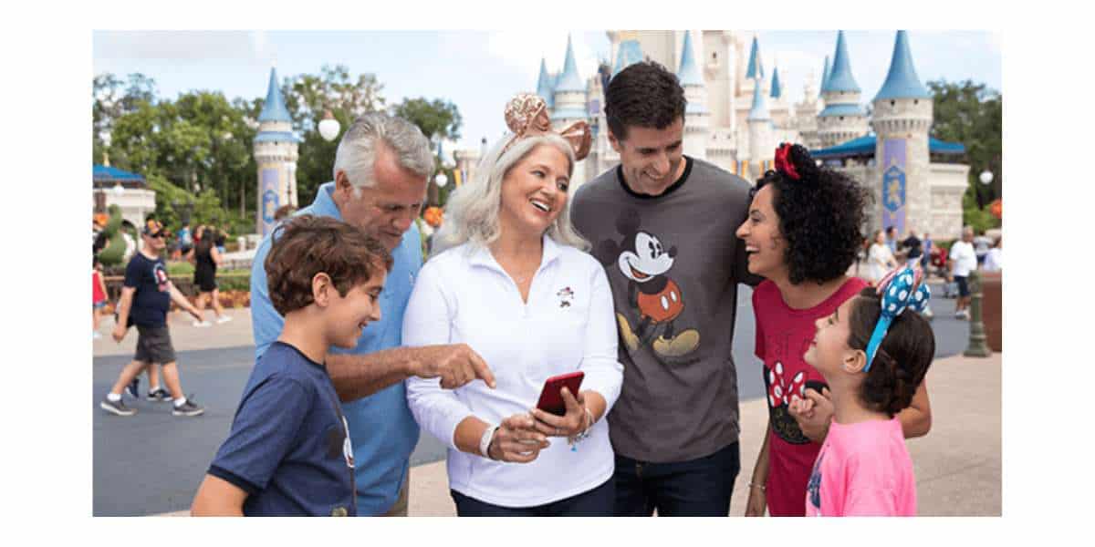 Guests on their cell phone in the Magic Kingdom, Walt Disney WOrld
