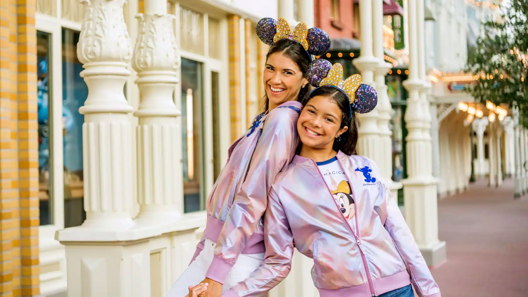 two guests in matching ears and jacket