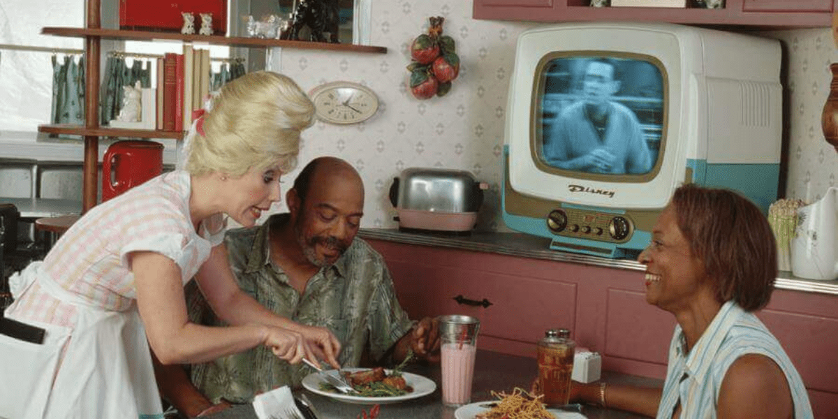 Waitress and Diners at 50's Prime Time Cafe