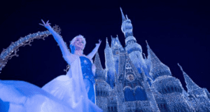 Elsa in Front of "Frozen" Cinderella Castle