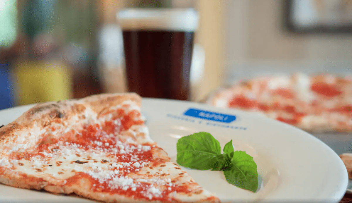 pizza slice at Via Napoli in EPCOT World Showcase