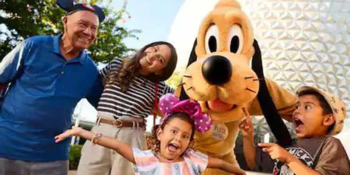 Family with Pluto at EPCOT