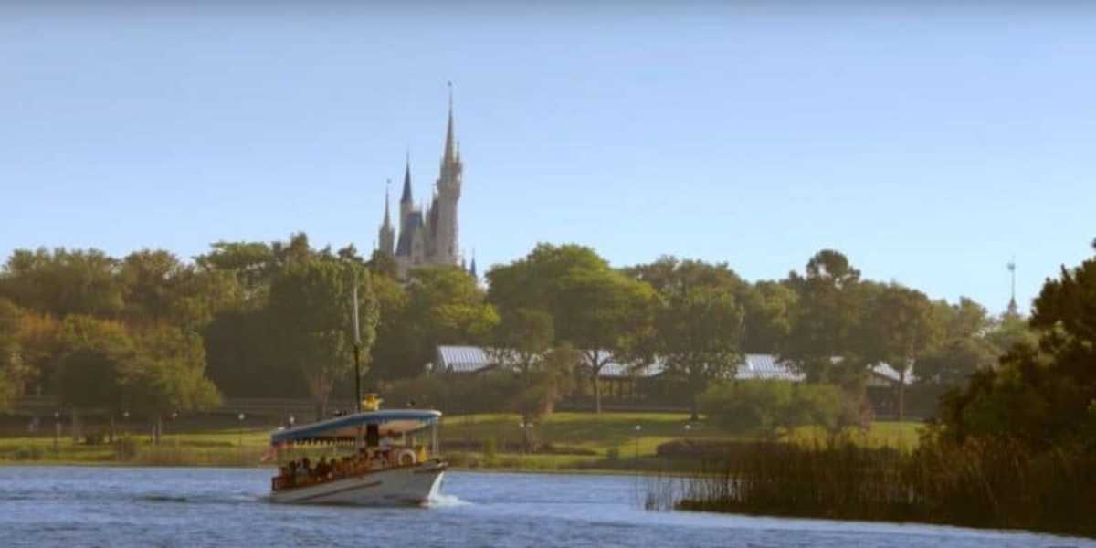 Magic Kingdom in the distance with boat transportation